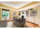 Bright office boasts custom built-ins, hardwood floors and large window with natural light at 102 Antler Point Rd, Chapel Hill, NC 27516