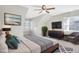 Well-lit bedroom featuring angled ceilings, dormer windows, and tasteful decor at 103 Aisling Ct, Cary, NC 27513