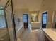 Bright bathroom featuring double vanity and makeup area with separate shower and tub at 105 Dairy Ct, Chapel Hill, NC 27516