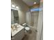 Cozy bathroom featuring a single vanity and a shower tub at 105 Dairy Ct, Chapel Hill, NC 27516
