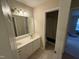 Bathroom featuring a double sink vanity with adjacent walk in shower at 105 Dairy Ct, Chapel Hill, NC 27516