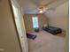 Bedroom with ceiling fan and large window offering relaxing sunlight at 105 Dairy Ct, Chapel Hill, NC 27516