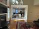 Open-concept kitchen featuring white cabinets, stainless appliances, and a central island at 105 Dairy Ct, Chapel Hill, NC 27516