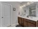 Modern bathroom featuring double vanity, recessed lighting, and shower at 106 Neuse Bluff Cir, Clayton, NC 27527