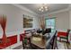 Inviting dining room featuring a chandelier and artwork, perfect for entertaining at 106 Neuse Bluff Cir, Clayton, NC 27527
