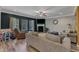 Comfortable living room featuring a fireplace and large windows at 106 Neuse Bluff Cir, Clayton, NC 27527
