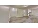 Spacious living room with modern floors connecting seamlessly to the kitchen area at 109 Stone Ridge Dr, Smithfield, NC 27577