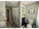 Bathroom featuring a shower, toilet, and vanity with modern fixtures at 1102 Poplar Ave, Garner, NC 27529