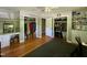 Spacious bedroom with hardwood floors, ceiling fan, and large closets at 1102 Poplar Ave, Garner, NC 27529