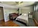 Inviting bedroom with a crib, plush bedding, and natural light at 1102 Poplar Ave, Garner, NC 27529