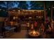This backyard features a grill, ping pong table, and fire pit - perfect for outdoor gatherings and recreation at 1124 Hardimont Rd, Raleigh, NC 27609
