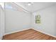 Bright bedroom with a modern ceiling fan and natural light, offering a comfortable and inviting space at 1124 Hardimont Rd, Raleigh, NC 27609