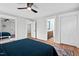 Comfortable bedroom with doors leading to a bathroom and closet at 1124 Hardimont Rd, Raleigh, NC 27609