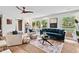 Spacious living room with large windows and contemporary furnishings, creating a relaxing atmosphere at 1124 Hardimont Rd, Raleigh, NC 27609