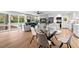 Stylish open-concept living room with hardwood floors, modern decor, and a bright, airy atmosphere at 1124 Hardimont Rd, Raleigh, NC 27609