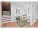 Spacious playroom with shelves filled with toys, offering a perfect area for to learn and play at 1124 Hardimont Rd, Raleigh, NC 27609