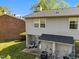 Exterior showing a backyard with a small patio and well-maintained lawn at 115 Coleridge Ct, Carrboro, NC 27510