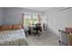 Bright bedroom with a desk in front of the window and a large closet at 115 Coleridge Ct, Carrboro, NC 27510