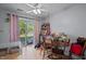 Bright dining area with sliding glass doors and an overhead ceiling fan at 115 Coleridge Ct, Carrboro, NC 27510