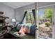 Comfortable living space with a view to the outside and a cozy place to relax at 115 Coleridge Ct, Carrboro, NC 27510