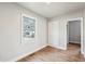 Bright bedroom with hardwood floors, large windows and a built in cabinet at 115 Higbee St, Durham, NC 27704