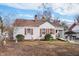 Charming single-story home with red shutters, accessible ramp, and brick foundation at 115 Higbee St, Durham, NC 27704