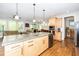 Spacious kitchen with large island, granite countertops, and stainless steel appliances at 1208 Steinbeck Dr, Durham, NC 27703