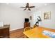 Office space with hardwood floors and natural light, suitable for a home office or study at 1208 Steinbeck Dr, Durham, NC 27703