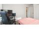 Bedroom with a desk, TV, and a window at 1304 Cozart St # 216, Durham, NC 27704