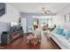 A bright living area boasts hardwood floors, contemporary decor, and an open flow to the kitchen at 1304 Cozart St # 216, Durham, NC 27704