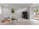 Finished basement with plush carpeting, contemporary furnishings, and ample natural light at 1310 Mayfair Rd, Raleigh, NC 27608
