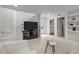 Spacious finished basement with stairs, an entertainment center, and access to other rooms at 1310 Mayfair Rd, Raleigh, NC 27608