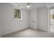 Bright bedroom with a ceiling fan, plush carpeting, and a tranquil view from the window at 1310 Mayfair Rd, Raleigh, NC 27608