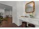 Elegant foyer with a chic console table, decorative mirror, and stylish patterned flooring at 1310 Mayfair Rd, Raleigh, NC 27608