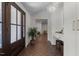 Bright foyer featuring patterned floors, decorative lighting, and a glimpse into adjacent living spaces at 1310 Mayfair Rd, Raleigh, NC 27608
