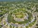 Community with lush greenery and varied home styles is showcased in this aerial view, emphasizing a vibrant and connected neighborhood at 1420 Willowleaf Way, Apex, NC 27502