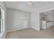 Spacious bedroom with neutral walls, plush carpet, and natural light coming through the window at 1420 Willowleaf Way, Apex, NC 27502