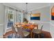 Formal dining room showcases stylish decor and view of the front yard at 1420 Willowleaf Way, Apex, NC 27502