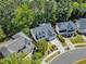 Well-manicured lawn and landscaping surround this beautiful two-story home at 1420 Willowleaf Way, Apex, NC 27502