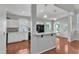 View of kitchen with breakfast bar and modern appliances at 1420 Willowleaf Way, Apex, NC 27502