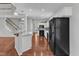 Modern kitchen connects to the living area and boasts granite countertops at 1420 Willowleaf Way, Apex, NC 27502