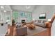 Inviting living area with high ceilings, fireplace, and ample seating at 1420 Willowleaf Way, Apex, NC 27502