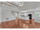 Expansive living space with stairs to second floor and view into kitchen at 1420 Willowleaf Way, Apex, NC 27502