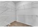 Walk-in closet with wire shelving, offering ample storage space at 1420 Willowleaf Way, Apex, NC 27502