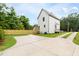 Home's backyard featuring a wooden fence and a back porch at 1448A Maplewood Dr, Durham, NC 27704