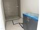 Modern bathroom with stylish gray tiled shower and vanity at 1448A Maplewood Dr, Durham, NC 27704