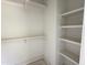 Spacious walk-in closet with built-in shelving at 1448A Maplewood Dr, Durham, NC 27704