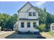 Charming two-story home features a modern design and inviting curb appeal at 1448A Maplewood Dr, Durham, NC 27704