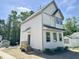 Exterior view of a two-story home with light siding and gray trim at 1448A Maplewood Dr, Durham, NC 27704