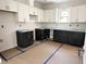 Modern kitchen with stylish two-tone cabinetry, and plenty of counter space at 1448A Maplewood Dr, Durham, NC 27704